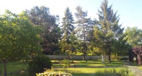 Exceptional atypical property with several buildings in a wooded park