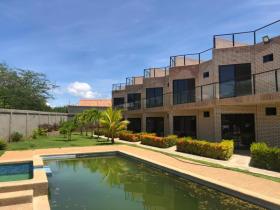 9 houses with pool for sale together in Playa el Yaque, Isla Margarita