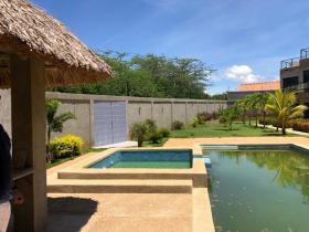 9 houses with pool for sale together in Playa el Yaque, Isla Margarita