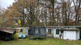 Old house in the middle of the forest in a chic area on a large, quiet lot