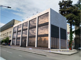 Three-story building with a basement